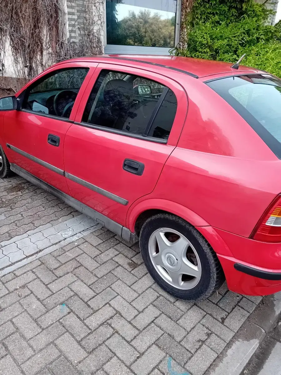 Occasion Opel Astra 125 ch (91 kW) 1998 Rouge Coupé