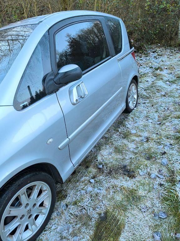 Gebraucht Peugeot 1007 Premium 75 PS (55 kW) 2010 Grau Van / Kleinbus