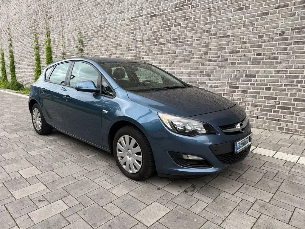 Używany Opel Astra Selection 87 KM (63 kW) 2012 Niebieski Sedan/Limuzyna
