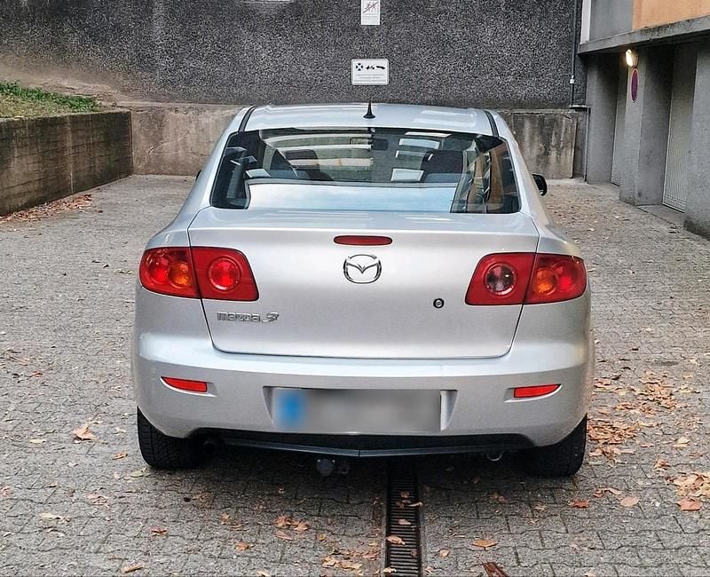 Second-hand Mazda 3 77 CP (56 kW) 2004 Argintiu Berlinǎ