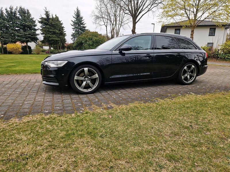Second-hand Audi A6 245 CP (180 kW) 2012 Negru Break