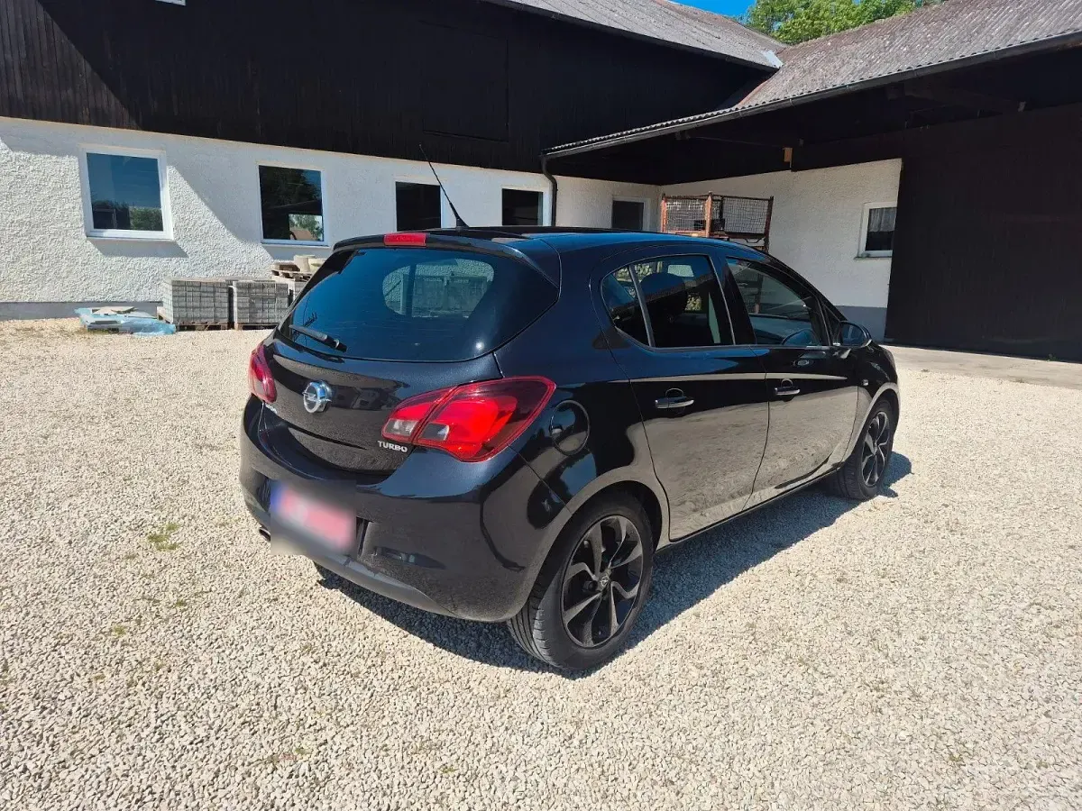 Używany Opel Corsa 101 KM (74 kW) 2015 Czarny Hatchback