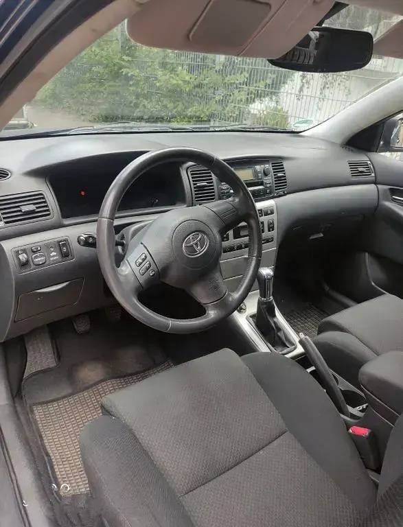 Gebraucht Toyota Corolla 110 PS (80 kW) 2004 Blau Limousine
