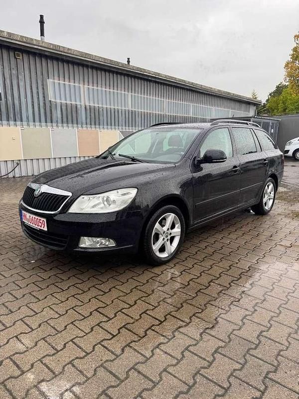 Cerna magic/black magic Gebraucht 2012 Skoda Octavia Ambition Kombi | 3.990 € (Guter Preis) - Bild 1/4