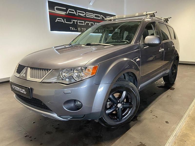Grau Gebraucht 2008 Mitsubishi Outlander Intense SUV | 5.700 € (Fairer Preis) - Bild 1/4