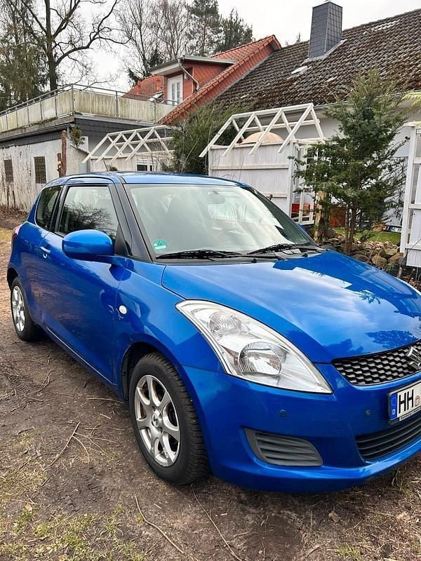 Blau Gebraucht 2012 Suzuki Swift Kleinwagen | 3.700 € (Superpreis) - Bild 1/4