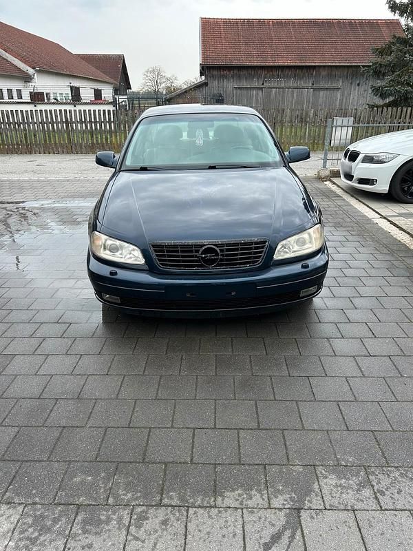 Second-hand Opel Omega 179 CP (131 kW) 2002 Albastru Berlinǎ