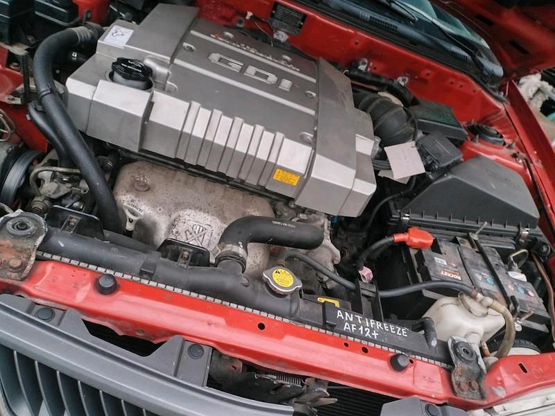 Gebraucht Mitsubishi Carisma 125 PS (91 kW) 1999 Rot Kombi