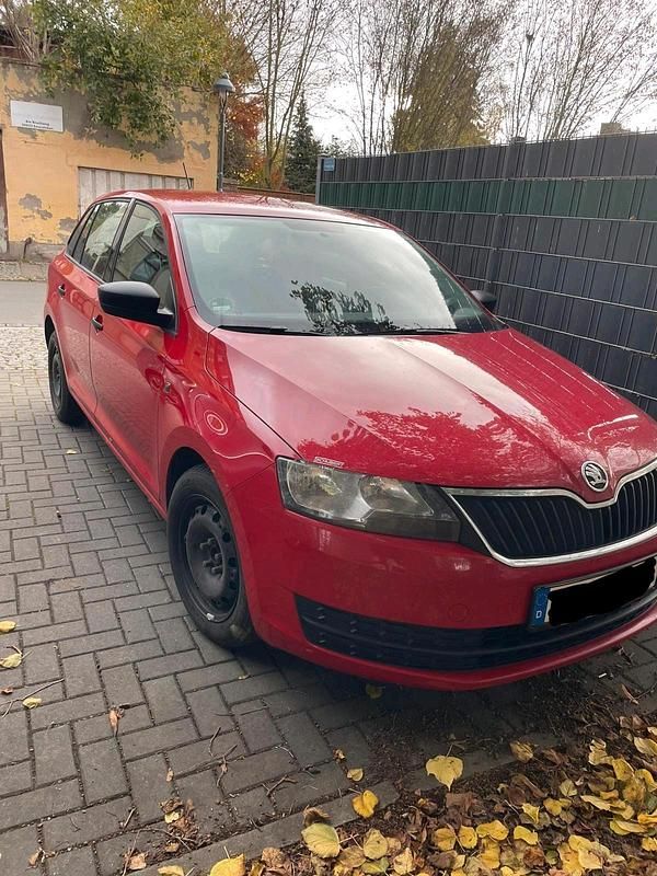 Rot Gebraucht 2014 Skoda Rapid Kombi | 5.900 € - Bild 1/4