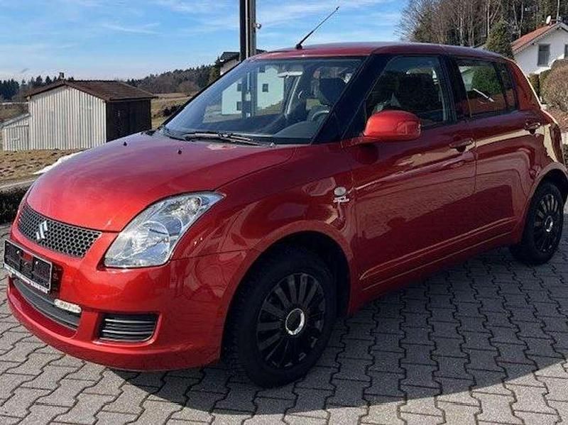 Gebraucht Suzuki Swift 92 PS (67 kW) 2008 Orange/braunmet. Kleinwagen