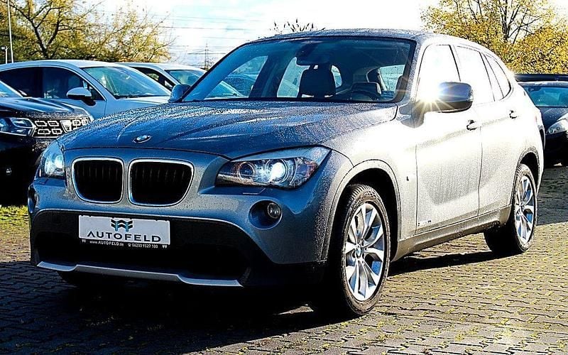 Grau Gebraucht 2012 BMW X1 Sport Line SUV | 10.800 € (Fairer Preis) - Bild 1/4