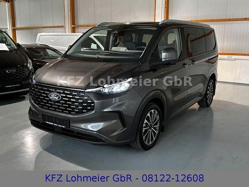 Magneticgrau metallic Neu 2025 Ford Tourneo Custom Titanium X Van / Kleinbus | 64.990 € (Etwas zu teuer) - Bild 1/4