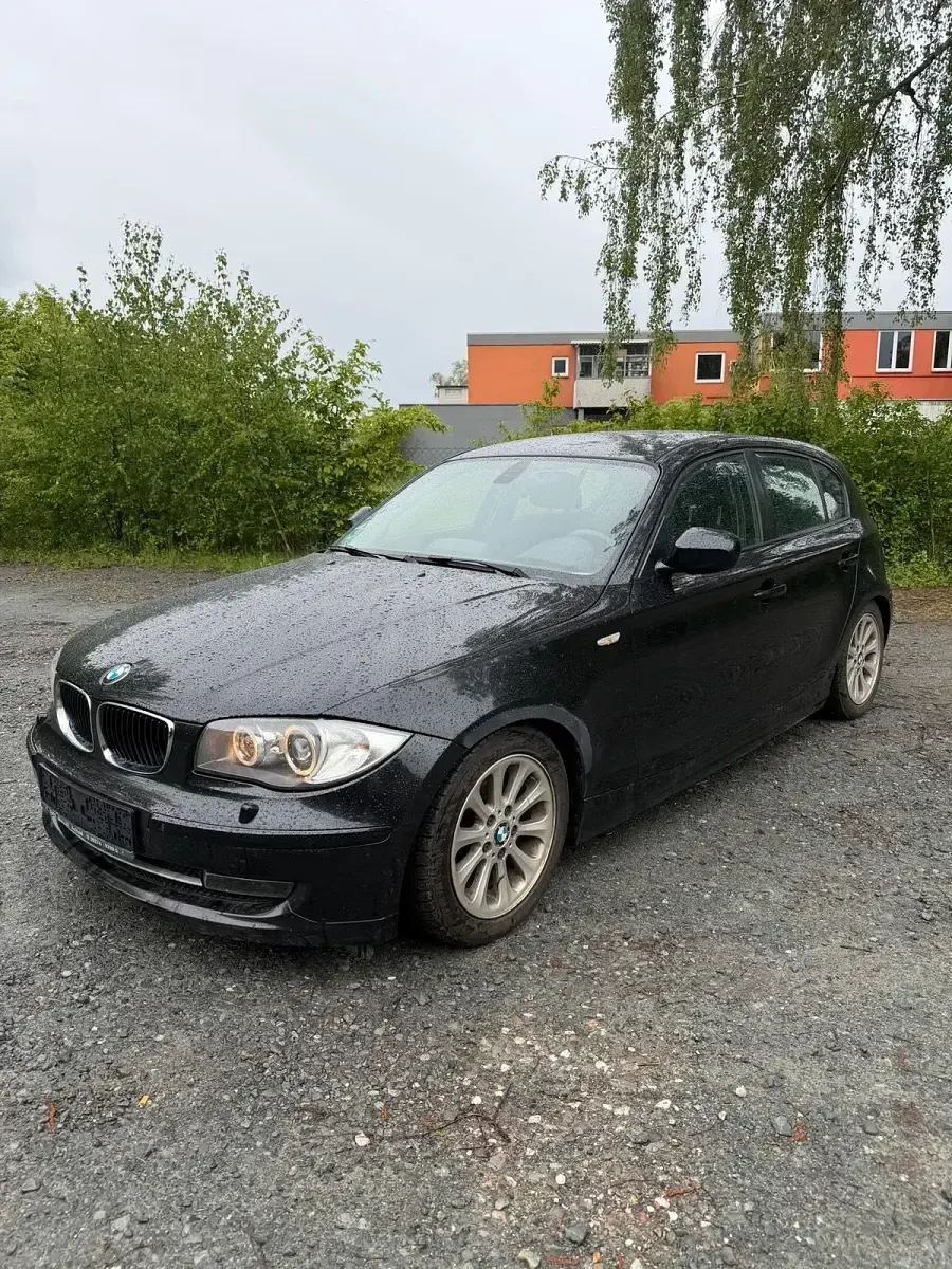 Second-hand BMW 116 116 CP (85 kW) 2009 Negru Hatchback