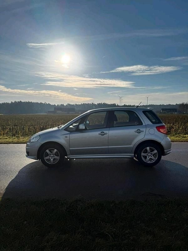 Gebraucht Suzuki SX4 120 PS (88 kW) 2010 Silber Limousine
