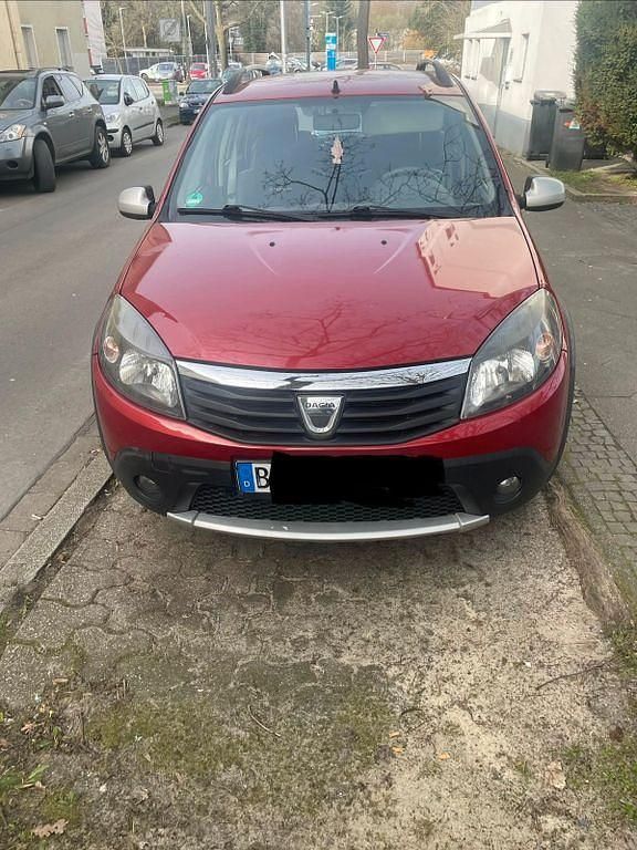 Gebraucht Dacia Sandero Stepway 84 PS (61 kW) 2013 Rot Limousine