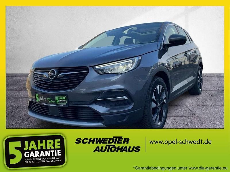 Mondstein grau/e:vulkan grau Gebraucht 2021 Opel Grandland X Elegance SUV | 11.890 € (Fairer Preis) - Bild 1/4