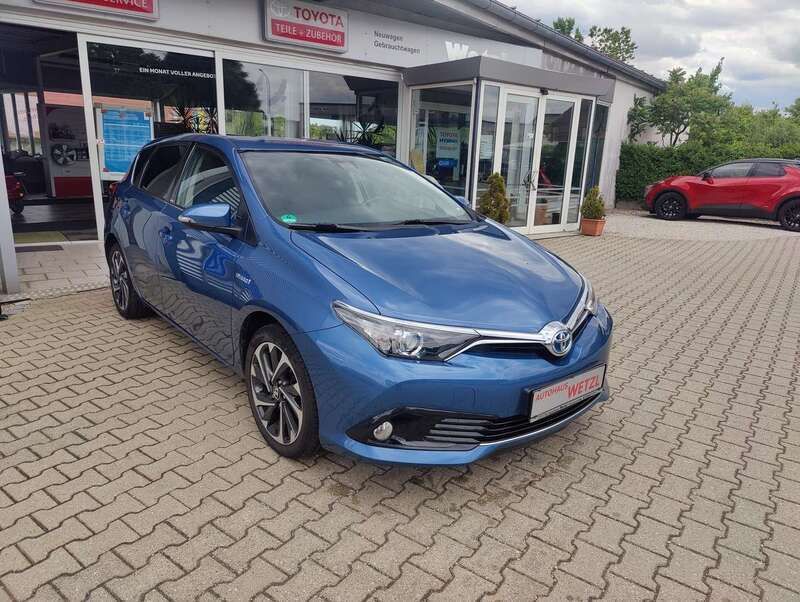 Denimblau metallic Gebraucht 2016 Toyota Auris Hybrid Edition-S Kleinwagen | 9.750 € (Fairer Preis) - Bild 1/4