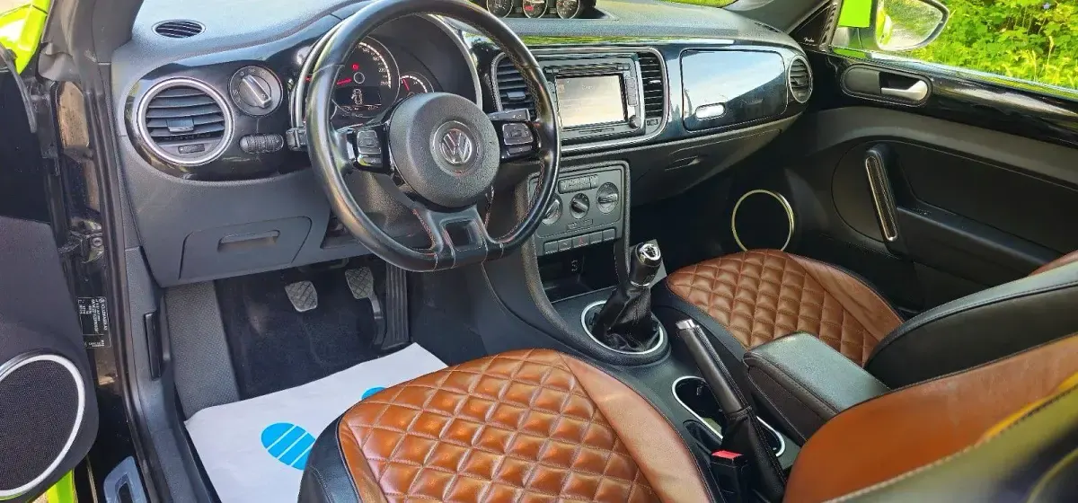 Gebraucht VW Beetle Exclusive 105 PS (77 kW) 2013 Grün Kleinwagen