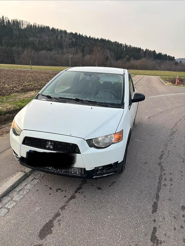 Gebraucht Mitsubishi Colt 95 PS (69 kW) 2012 Weiß Kleinwagen