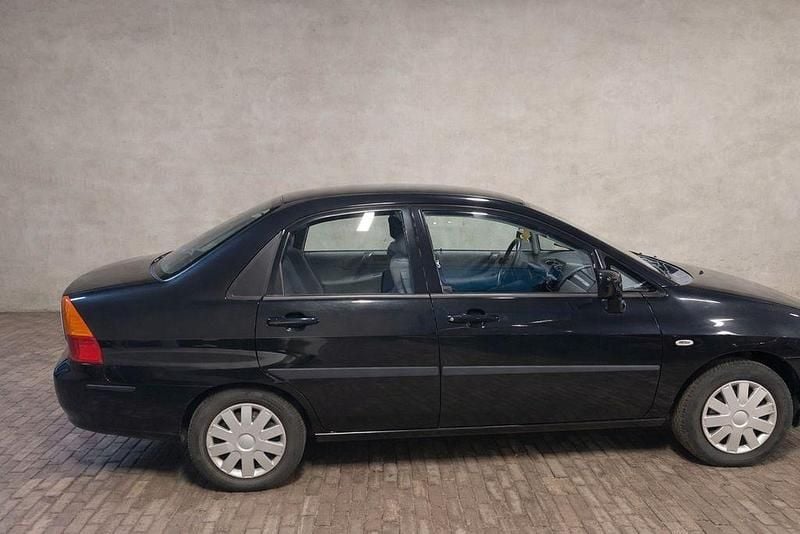 Gebraucht Suzuki Liana Comfort 106 PS (77 kW) 2002 Schwarz Limousine