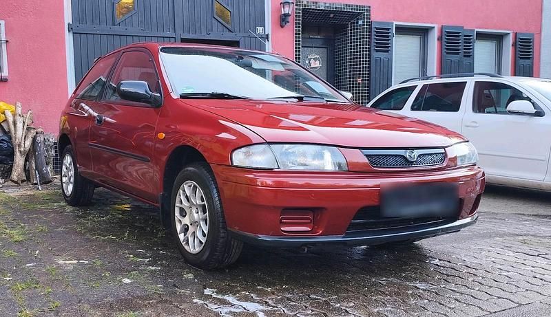 Gebraucht Mazda 323F Edition 88 PS (64 kW) 1998 Braun Kleinwagen