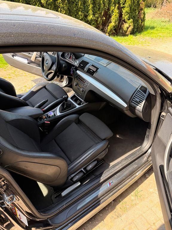 Second-hand BMW 120 Performance 177 CP (130 kW) 2009 Negru Hatchback