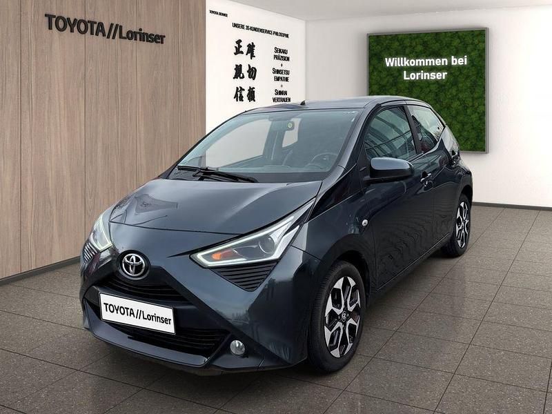 Rauchgrau mica Gebraucht 2018 Toyota Aygo Basis Kleinwagen | 12.490 € (Fairer Preis) - Bild 1/4