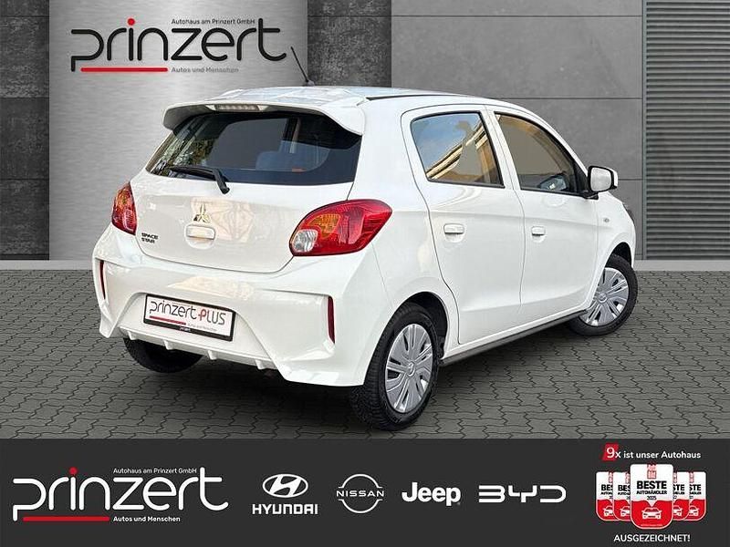Gebraucht Mitsubishi Space Star Select 71 PS (52 kW) 2023 Islandweiss (s) Kleinwagen