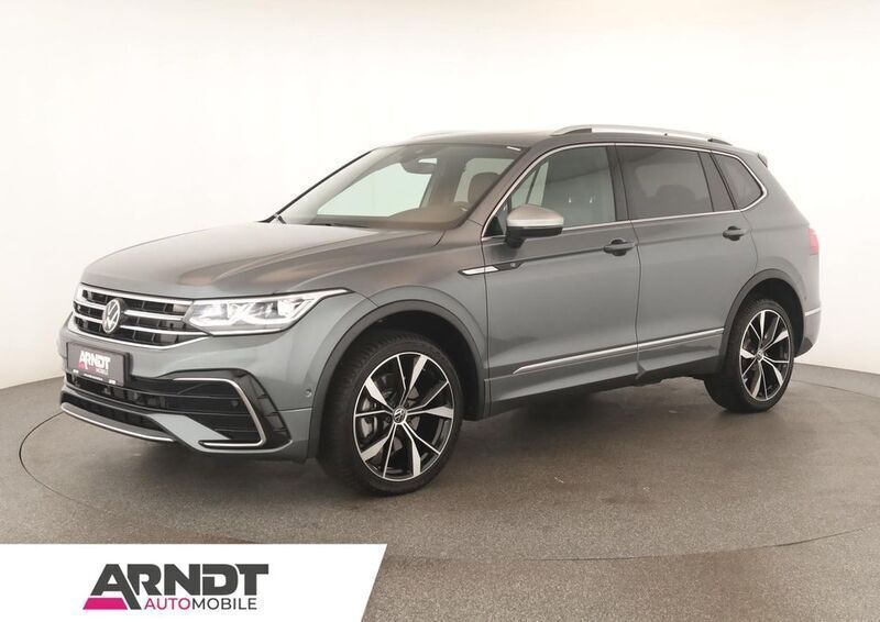 Platinum grey Gebraucht 2024 VW Tiguan Allspace R-line SUV | 48.684 € (Etwas zu teuer) - Bild 1/4