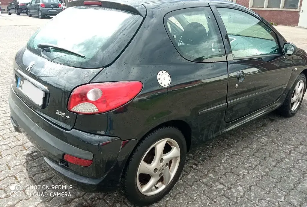 Gebraucht Peugeot 206+ 75 PS (55 kW) 2010 Schwarz Kleinwagen