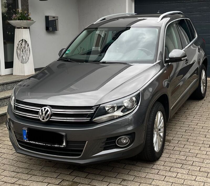 Grau Gebraucht 2014 VW Tiguan Cup SUV | 12.800 € (Fairer Preis) - Bild 1/4