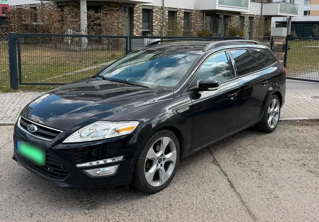 Używany Ford Mondeo 115 KM (84 kW) 2011 Czarny Kombi