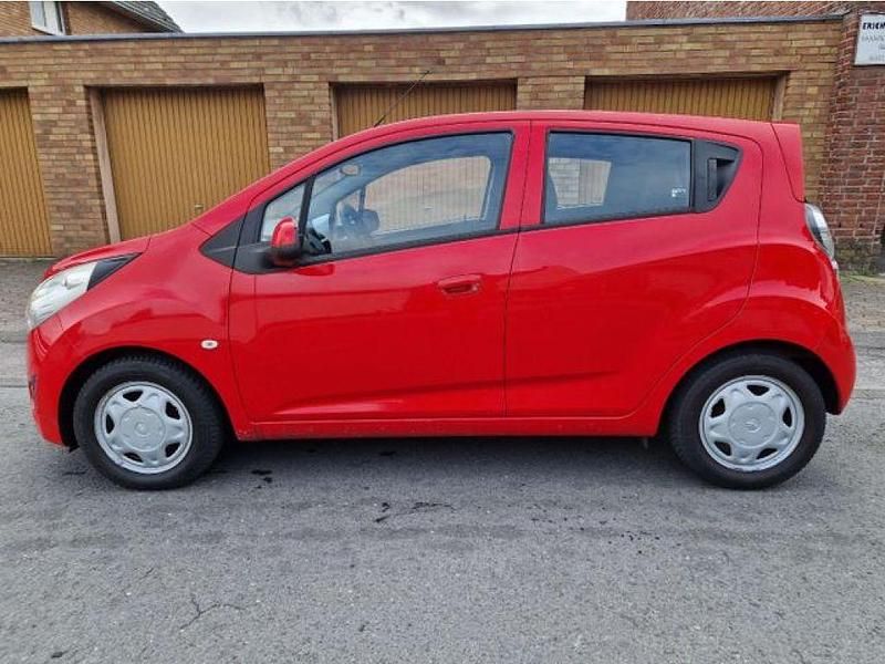 Racingrot Gebraucht 2012 Chevrolet Spark Kleinwagen | 4.399 € (Teuer) - Bild 1/4