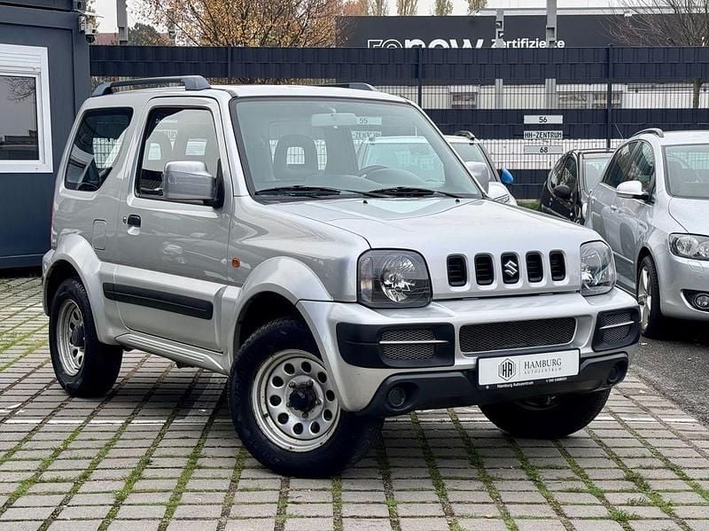 Silber Gebraucht 2010 Suzuki Jimny Comfort SUV | 12.970 € (Fairer Preis) - Bild 1/4