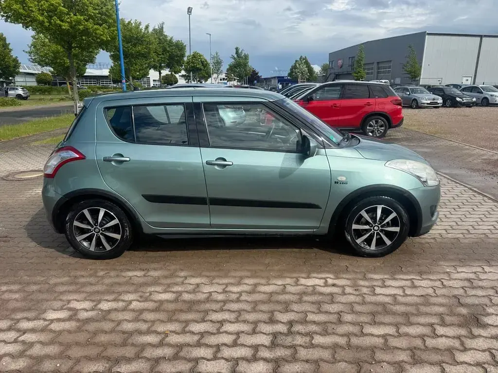 Gebraucht Suzuki Swift 94 PS (69 kW) 2012 Grün Kleinwagen