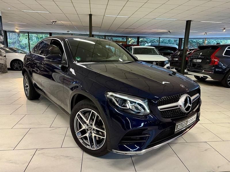 Gebraucht Mercedes GLC250 AMG line 211 PS (155 kW) 2019 Cavansitblau Coupé