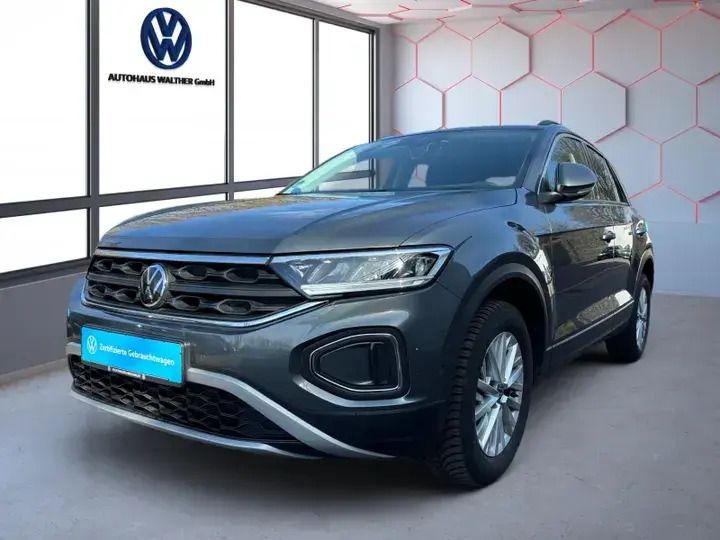 Indiumgrau metallic Gebraucht 2024 VW T-Roc Life SUV | 24.850 € (Fairer Preis) - Bild 1/4