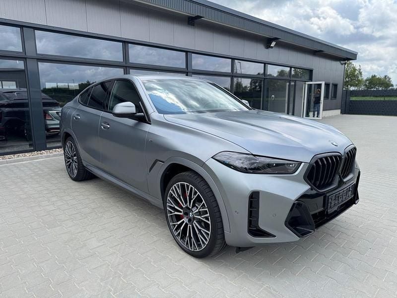Grau Gebraucht 2024 BMW X6 M Sport SUV | 82.898 € (Superpreis) - Bild 1/4