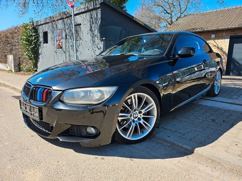 Schwarz Gebraucht 2010 BMW 325 Cabriolet M Sport Cabrio | 9.399 € (Superpreis) - Bild 1/4