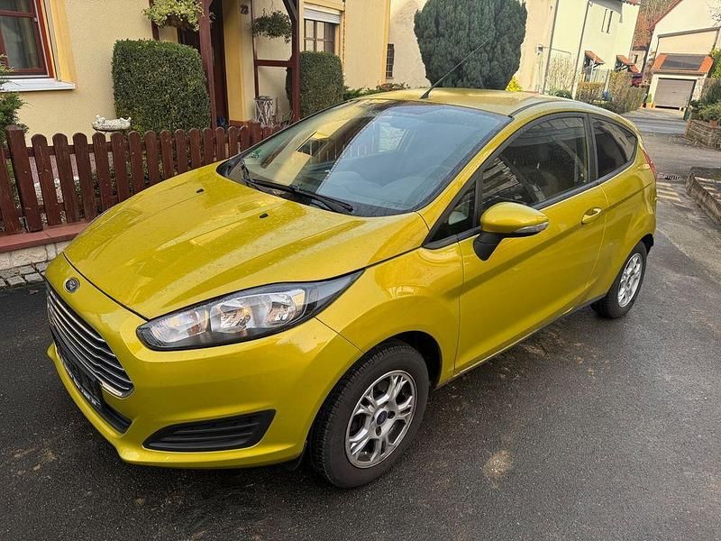 Gelb Gebraucht 2013 Ford Fiesta Trend Kleinwagen | 3.600 € (Fairer Preis) - Bild 1/4
