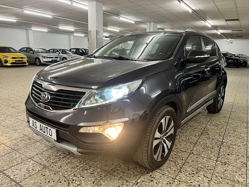 Grau Gebraucht 2012 Kia Sportage Spirit SUV | 5.498 € (Superpreis) - Bild 1/4