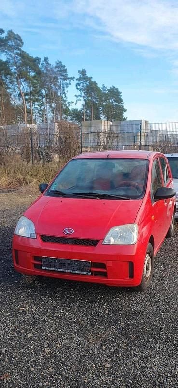 Gebraucht Daihatsu Cuore 58 PS (42 kW) 2003 Rot Kleinwagen