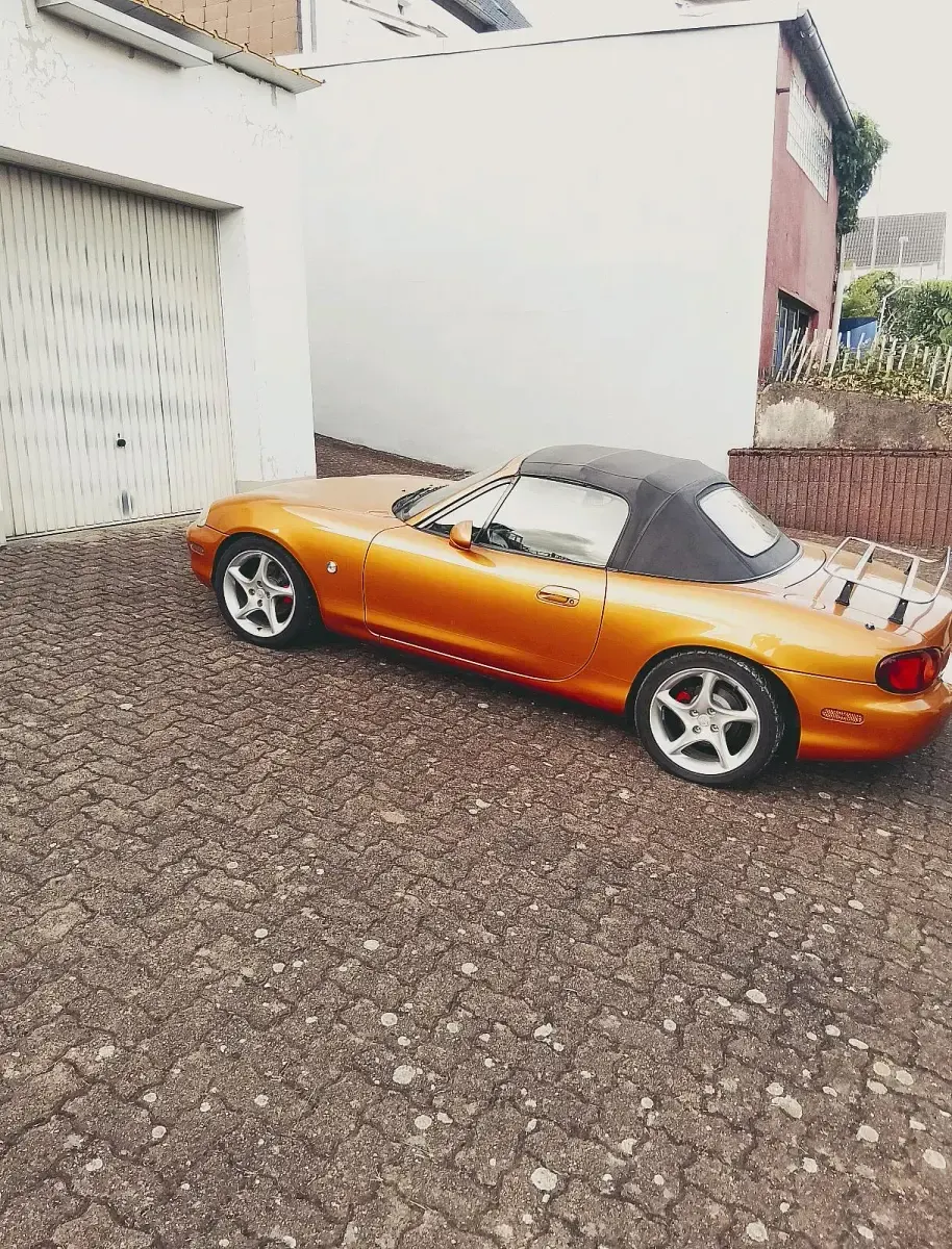 Gebraucht Mazda MX5 115 PS (84 kW) 1997 Orange Cabrio