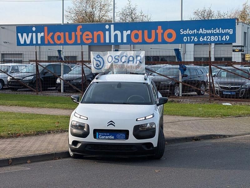 Weiß Gebraucht 2014 Citroën C4 Cactus Feel Kleinwagen | 6.799 € (Fairer Preis) - Bild 1/4