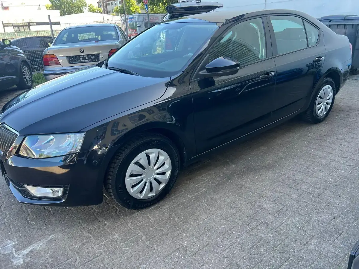 Gebraucht Skoda Octavia Ambition 105 PS (77 kW) 2014 Schwarz Kombi