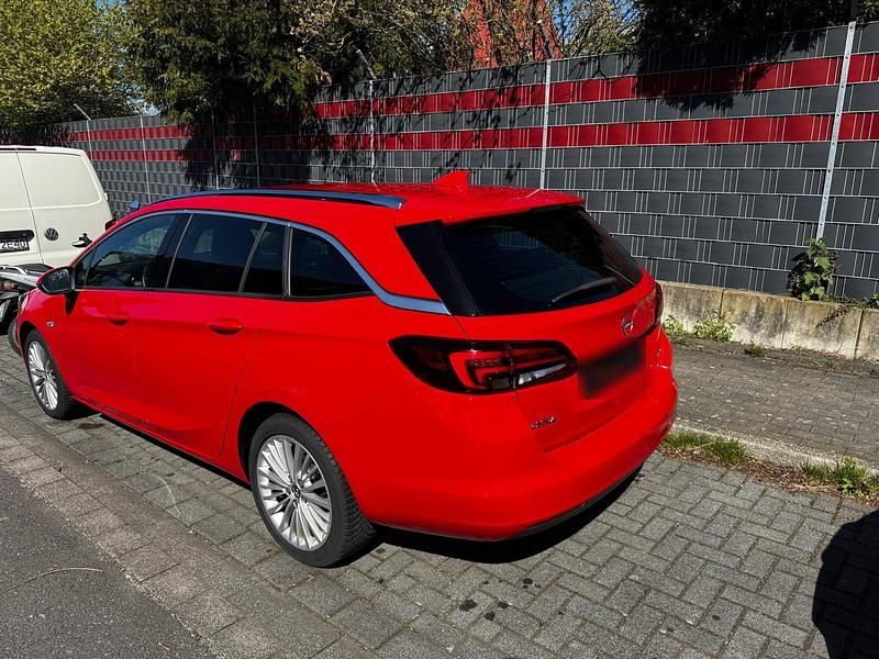 Second-hand Opel Astra 125 CP (91 kW) 2016 Roșu Break