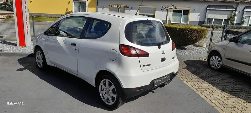 Gebraucht Mitsubishi Colt 75 PS (55 kW) 2009 Weiß Kleinwagen