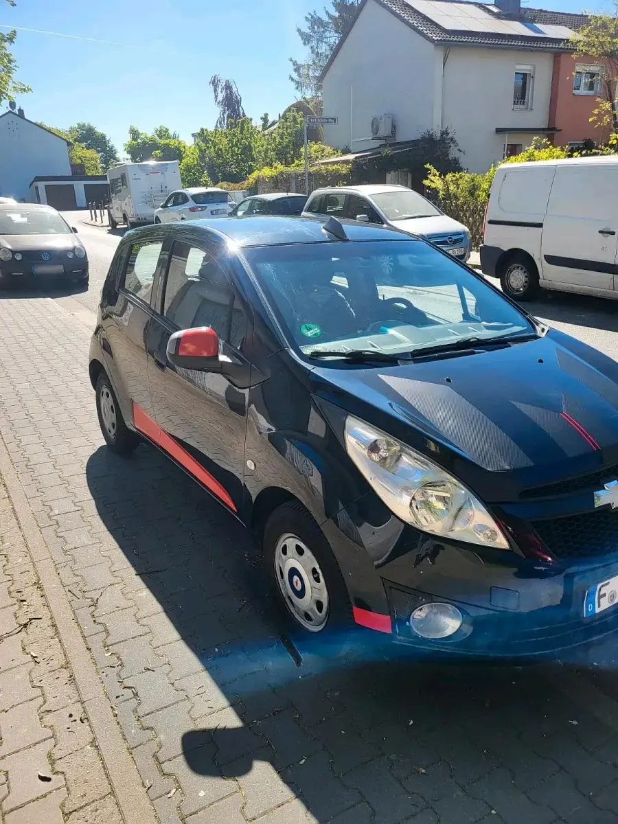 Gebraucht Chevrolet Spark 68 PS (50 kW) 2012 Schwarz Kleinwagen