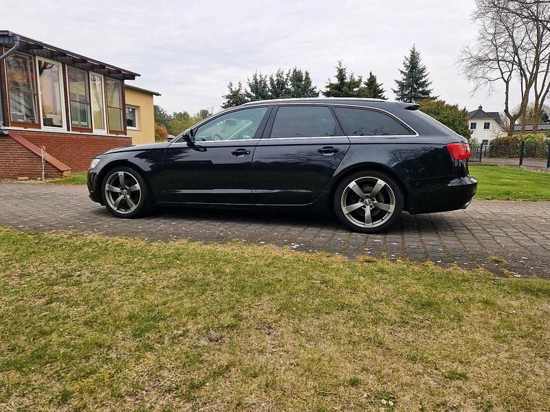 Second-hand Audi A6 245 CP (180 kW) 2012 Negru Break