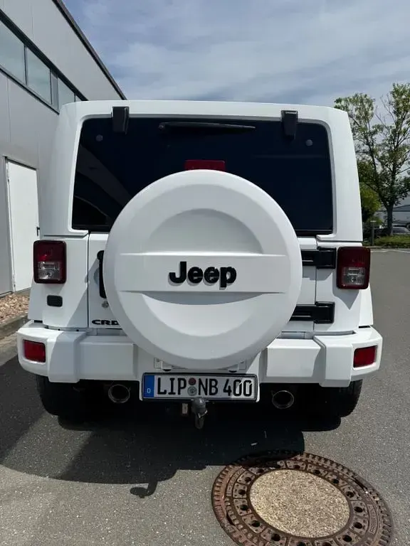 Gebraucht Jeep Wrangler Unlimited 200 PS (147 kW) 2014 Weiß SUV